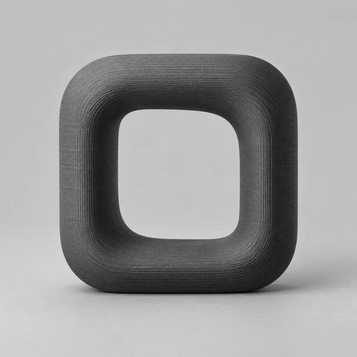 Neutral graphite material study — placeholder product imagery